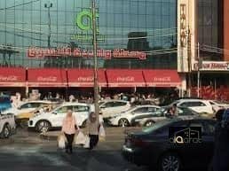 عمارة تجارية ركن للبيع في منطقة حي الجامعة (١٢٠٠ م²) السعر للمتر ٨٥٠٠ دولار
